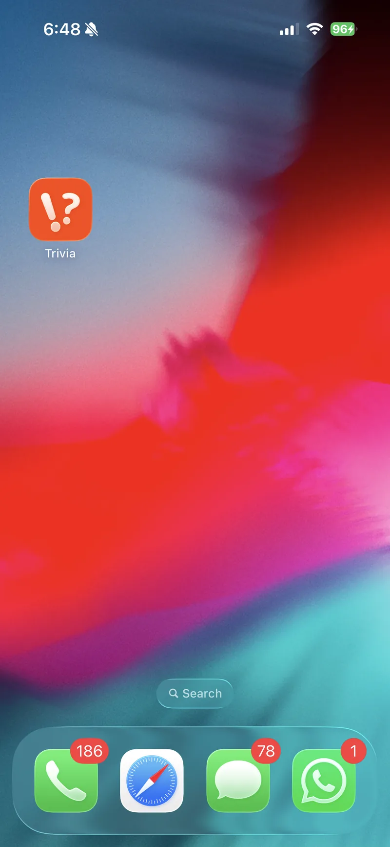 Trivia on an iPhone home screen, next to other apps
